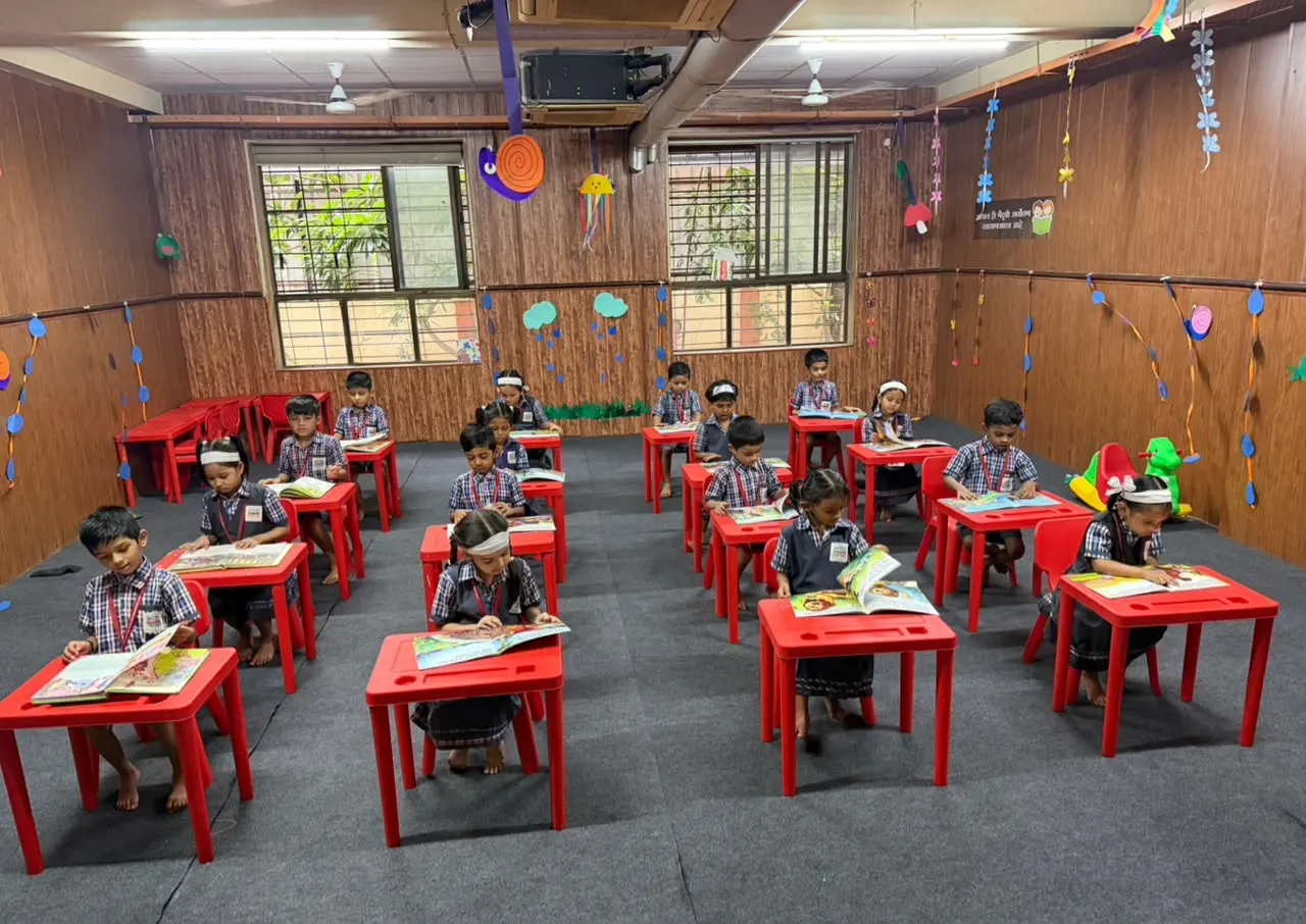 Students reading in school library